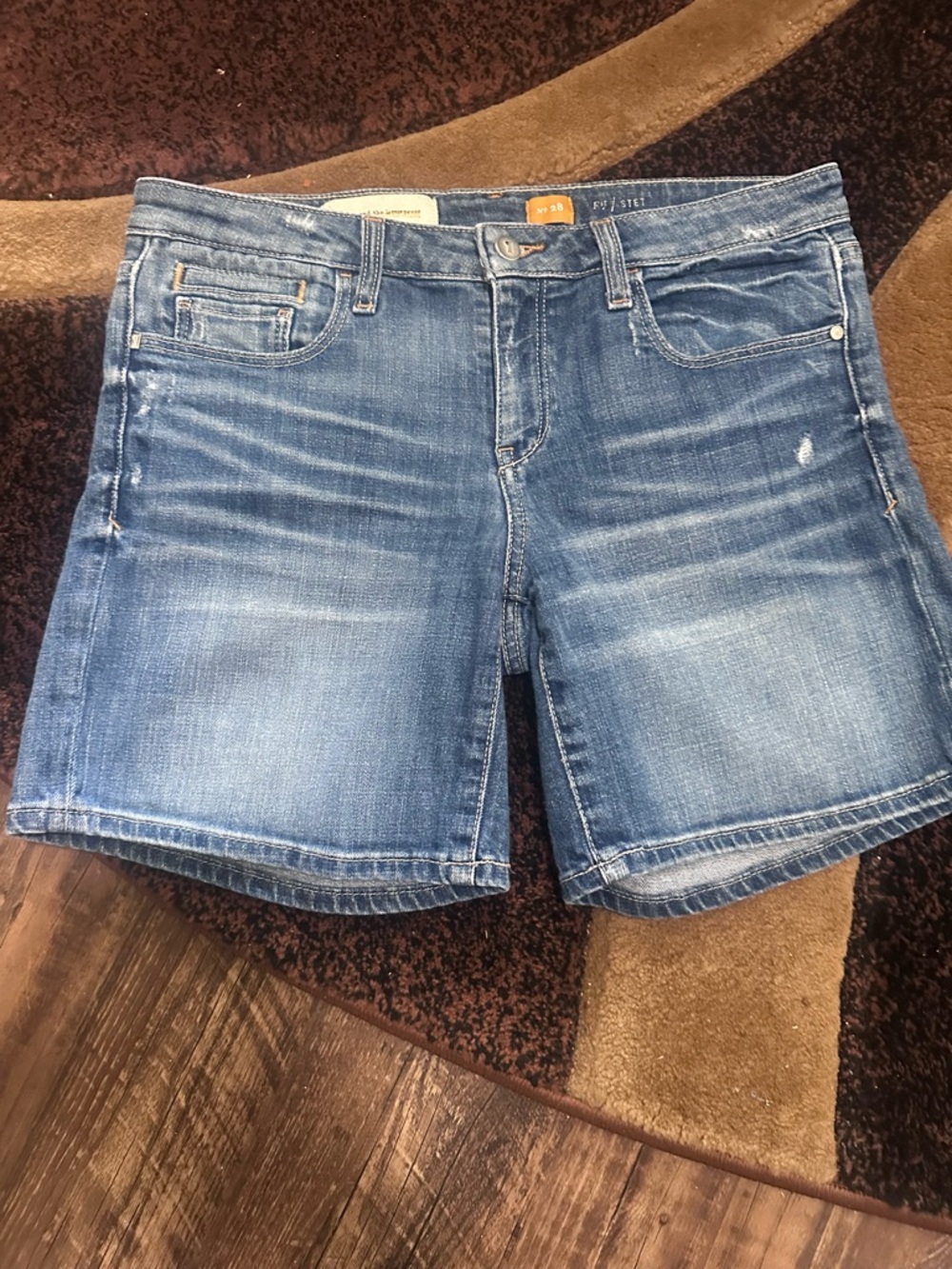 Pilcro Distressed Medium Blue Denim Shorts by Anthropologie